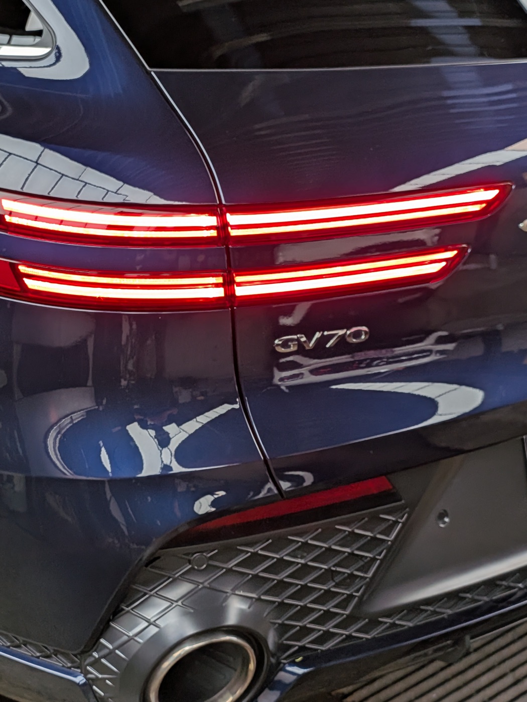 Genesis GV70 taillight and badge detail after paint correction